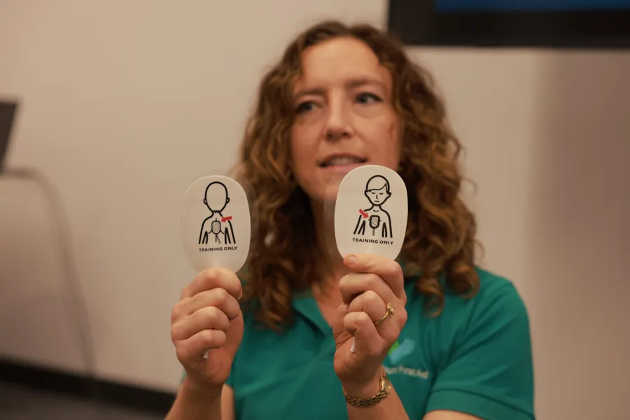 Leah, paramedic and founder, teaching a first aid course